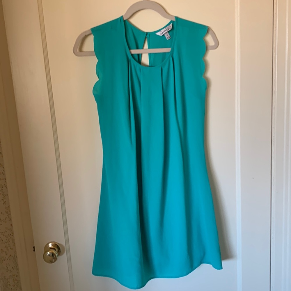Speckless size small scalloped sleeve dress in teal. Worn 1X. Just above knees